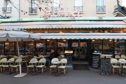 The famous cafe Le Select decorated for Christmas , Paris, France. Stock Photos