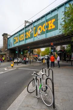Famous Camden Lock bridge on Camden High Street with the painted yellow sign Stock Photos