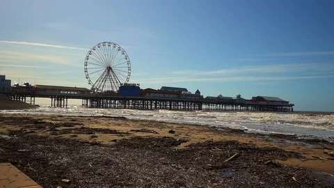 The famous central pier by Blackpool Tower and seaside Stock Footage 106068047