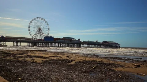 The famous central pier by Blackpool Tower and seaside Stock Footage 106068048