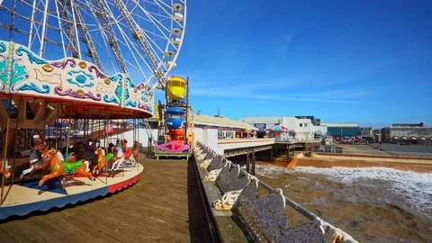 The famous central pier by Blackpool Tower and seaside Stock Footage 106068293