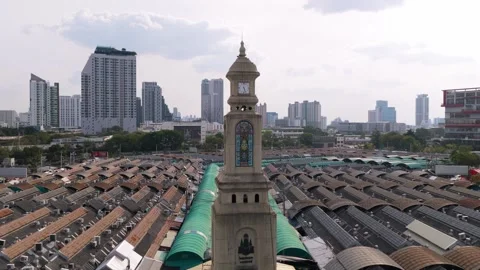 Famous Chatuchak weekend market clock tower, iconic landmark in Bangkok. Aerial Video stock 327208617