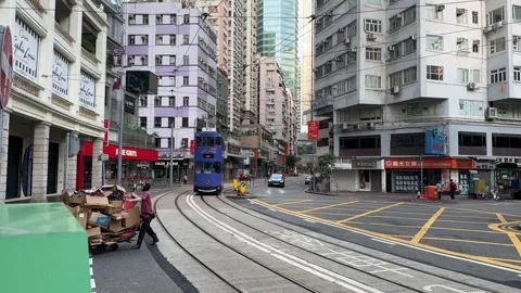 Famous double-decker trams in Hong Kong, China Stockbeeldmateriaal 289692360