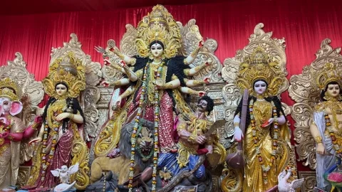 Famous Durga Puja idol in red background in Kolkata Stock Footage 328205033