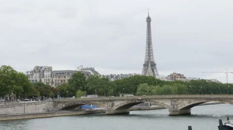 Famous Eiffel tower and Alexander III bridge golden statues in Paris France 4K Stock Footage 67193049