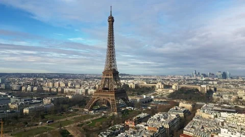 The famous Eiffel Tower with a dizziness aerial effect at middle altitude, Stock Footage 281216450