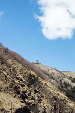 Famous Gergeti Trinity Tsminda Sameba church in Georgia Stock Photos