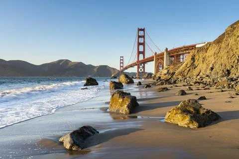Famous Golden Gate Bridge over bay against blue sky, San Francisco, San Stock Photos
