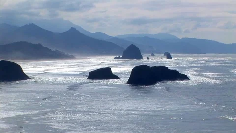 Famous Haystack Rock in Cannon Beach  along the Oregon Coast, Oregon USA Stock Footage 102188806