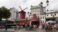 Famous Iconic Moulin Rouge Cabaret Show Paris Car Traffic People Passing Walking HD Footage