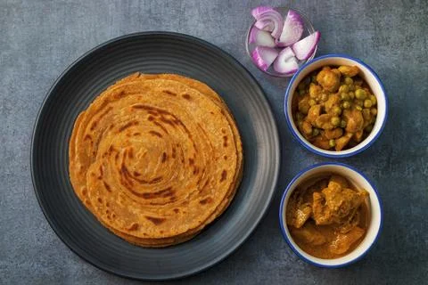 Famous Indian flat bread "Methi Paratha".Made of fenugreek leaf and flour. Stock Photos