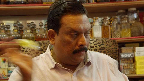 Famous indian perfumer Ramakrishna creates a unique perfume. Mapusa, Goa Stock Footage 129139210