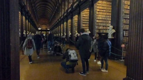 The famous interior view of the Book of Kells of Trinity College in Dublin Ir 스톡 동영상 108857215