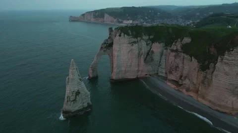 The famous limestone cliffs at Etretat at sunset, France Stock Footage 294108510