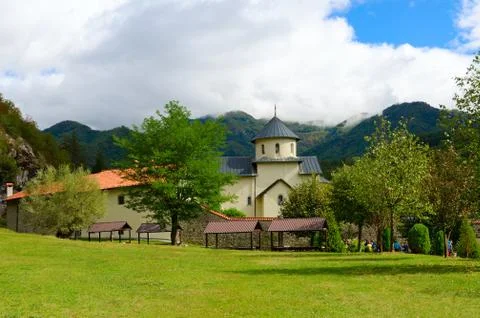 Famous monastery of Moraca on background of mountains on sunny day, Montenegro Stock Photos
