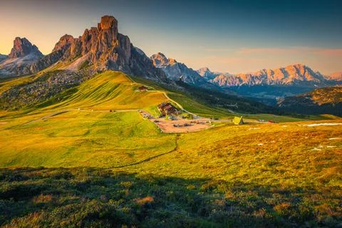 Famous mountain pass with sunset lights, Dolomites, Italy Stock Photos