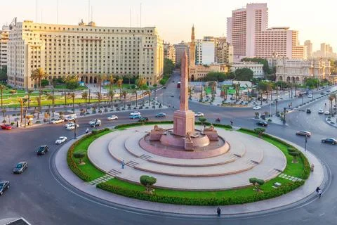 Famous Obelisk in the middle of Tahrir square, main government place of Cairo Stock Photos