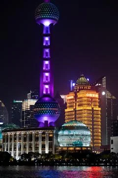 Famous Shanghai tower and sphere shaped building with night neon illumination Stock-Fotos