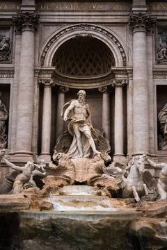 Famous statue of Neptune in the iconic Trevi Fountain in Rome Famous statu... Stock Photos
