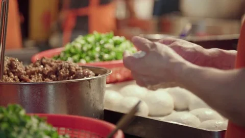 Famous Taiwan street food, making of Hu Jiao Bing (Pepper pork bun) Stock Footage