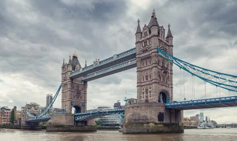 Famous Tower Bridge with dramatic cloudy sky in London, England Stock Photos