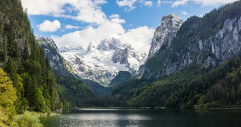 Famous view of the Dachstein Glacier with clouds and mountain like. Stock Footage 252666352