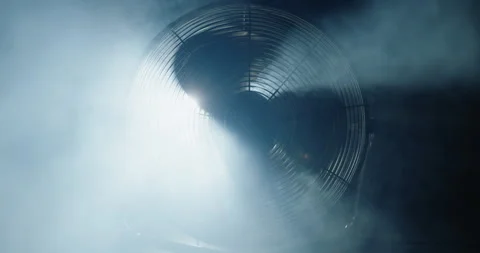 Fan blades rotate in clouds of smoke Stock Footage 250165609