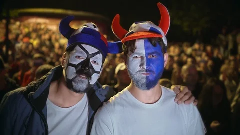 Fan closeup different team negatively look at the camera, displeased bad game Stock Footage 103754736