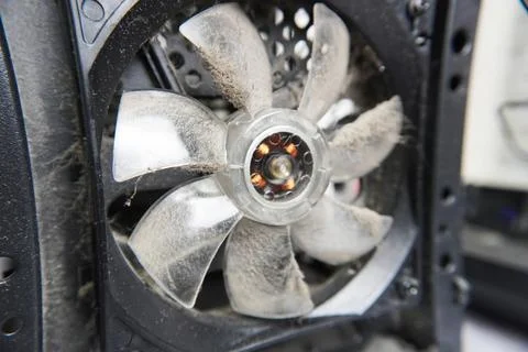 The fan in the computer is covered with dust. Foto stock