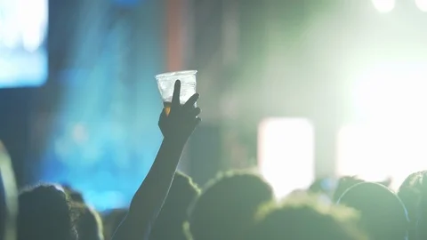 A fan with a drink Stock Footage 115082753