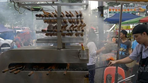 Fan drying bbq chicken wings Stock Footage 87690095