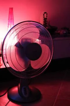 Fan with red background light 스톡 사진