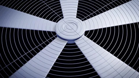 The fan rotates quickly against a black background in a looped animation. 库存影片 85098902