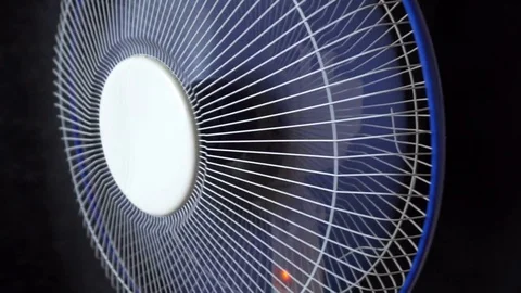 The fan is spinning on black background Stock Footage 76781646