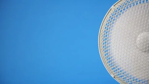 Fan ventilator on right side on blue background, switch on, working and off Видео 157594944