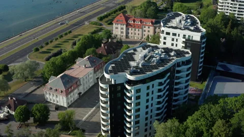 Fancy apartment buildings with solar panel roofs Stock Footage 198589474
