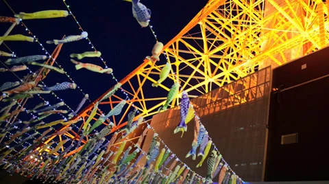 Fancy carp flags underneath the Tokyo tower, Tokyo Japan Stock Footage 37689803