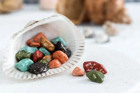 Fancy chocolates in the shape of sea pebbles. Stock Photos