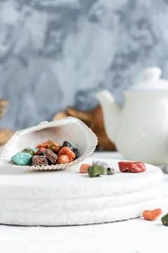 Fancy chocolates in the shape of sea pebbles. Stock Photos