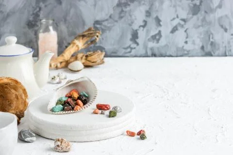 Fancy chocolates in the shape of sea pebbles. Stock Photos