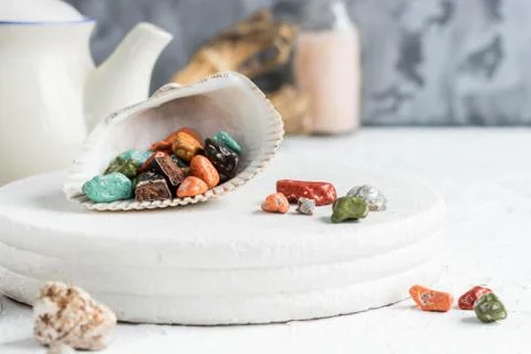 Fancy chocolates in the shape of sea pebbles. Stock Photos