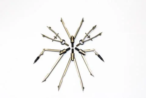 Fancy circle formed by the items intended for drawing curved shapes - compass Stock Photos