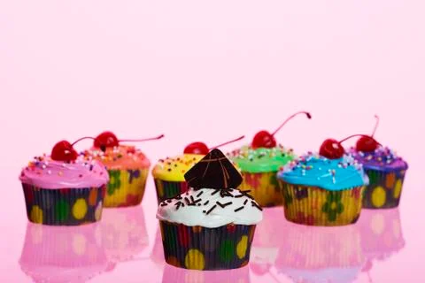 Fancy cupcakes on pink Stock Photos