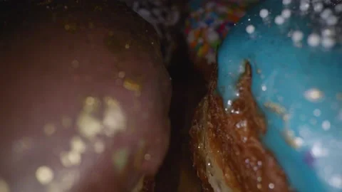 Fancy decorated donuts in close-up 库存影片 154191698