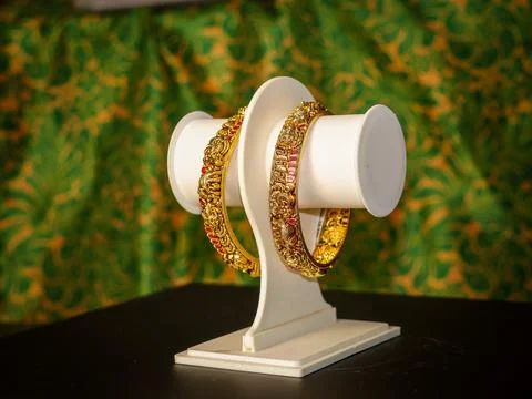 Fancy designer antique golden Bangles collection with gemstones. 스톡 사진
