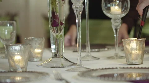 Fancy dining table being set in slow motion Stock Footage 49751052