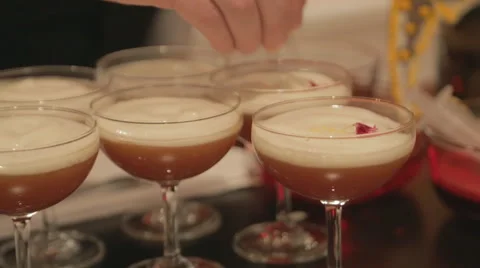 Fancy drink coctail garnish Stock Footage 64904534