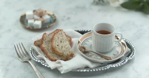 Fancy English tea and cake served on silverware in ultra slow motion closeup wit Stock Footage 199459234
