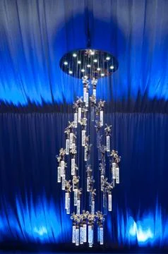 A fancy glass Chandelier in the hotel Stock Photos