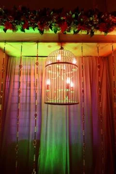 Fancy lamp inside a bird cage Stock Photos